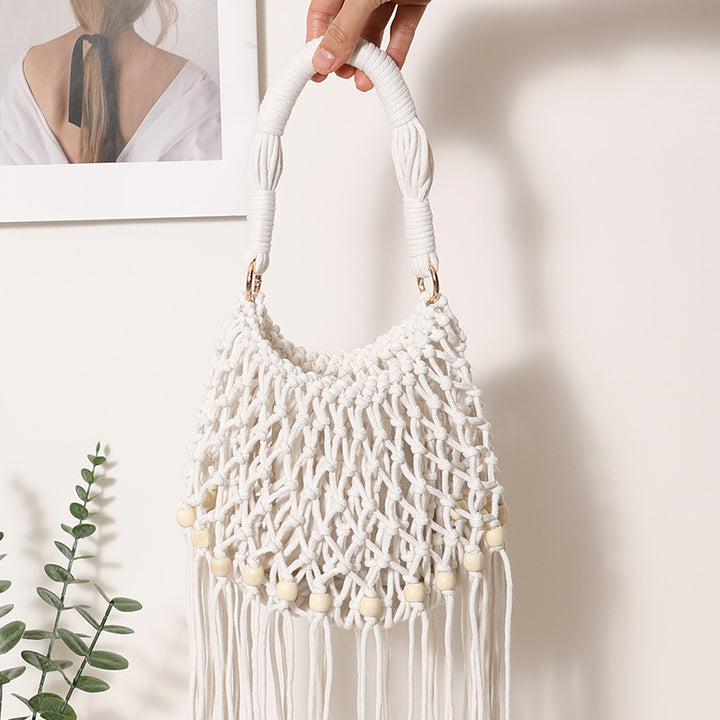 Macrame bag with decorative fringes and wooden beads Bowlift