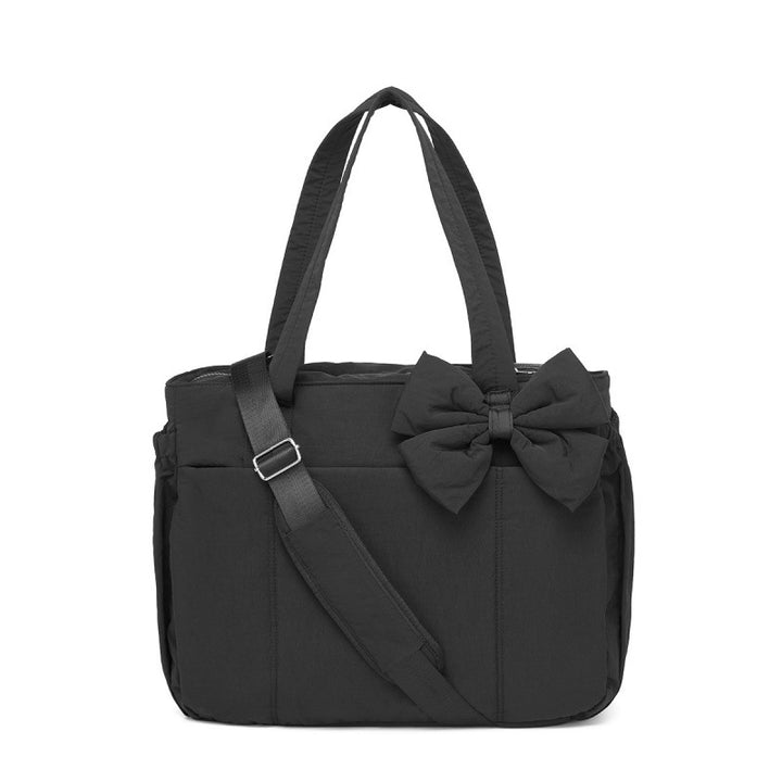 Fashionable tote bag with elegant bow appliqué Bowlift