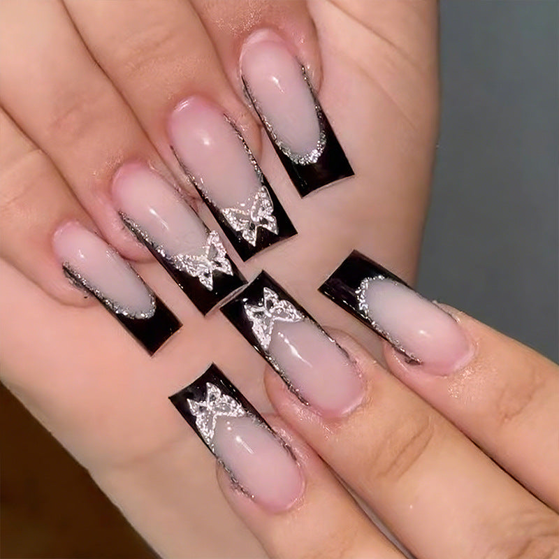 Glamorous artificial nails with detailed decorations Bowlift