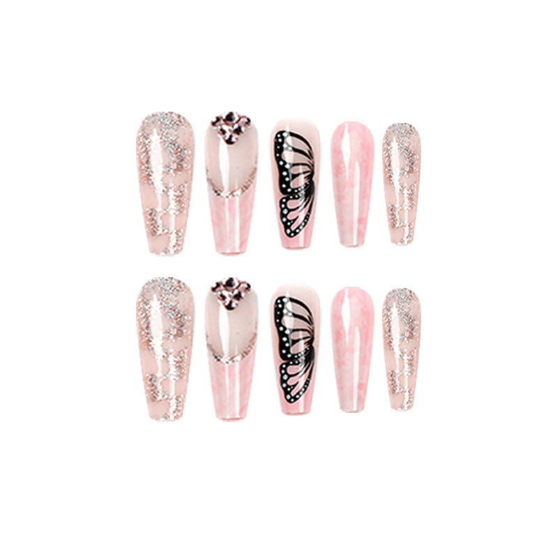 Glamorous nail extensions with beautiful butterfly motifs and glitter accents Bowlift