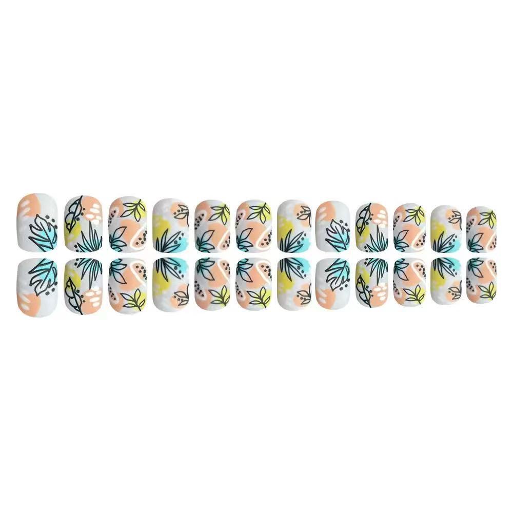 Nail art set with floral accents and creative design Bowlift