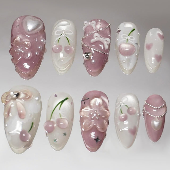 Artificial nail set with decorative floral motifs and glamorous accents Bowlift