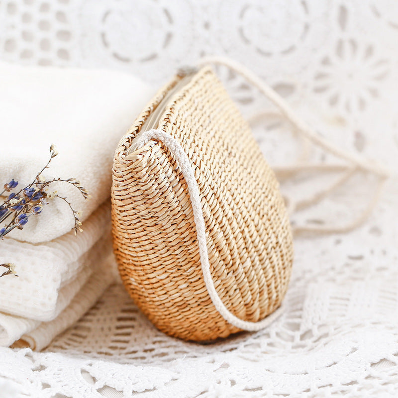 Handcrafted basket bag in unique half-moon design Bowlift