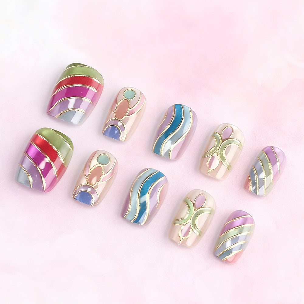 Artistic Press-On Nail Set with Gold Accents Bowlift