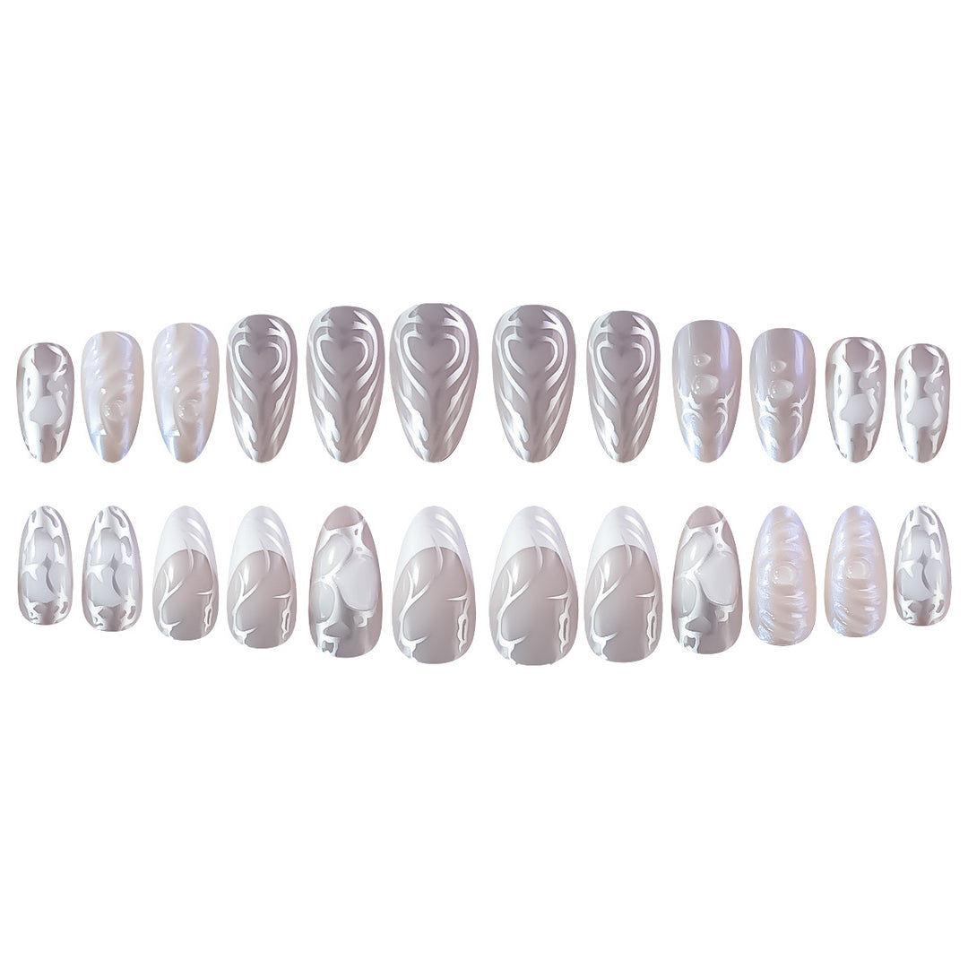 Elegant Stiletto Nail Extensions with Decorative Silver Accents Bowlift