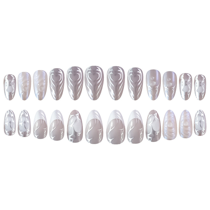 Elegant Stiletto Nail Extensions with Decorative Silver Accents Bowlift