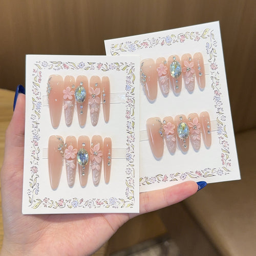 Artificial artificial nails with floral decorations and glitter details Bowlift