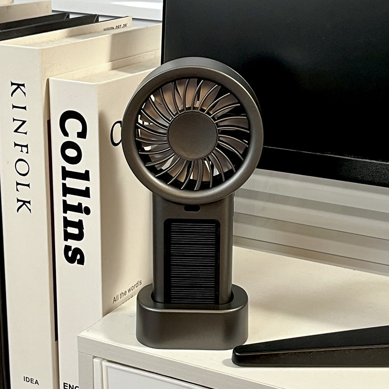 Unisex compact rechargeable table and hand fan with charging station Bowlift