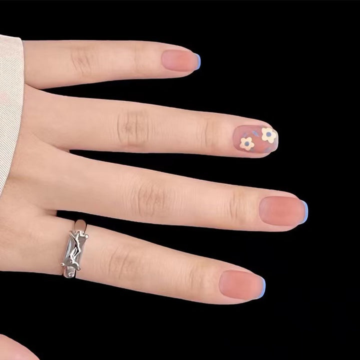 Creative nail design with floral accents Bowlift