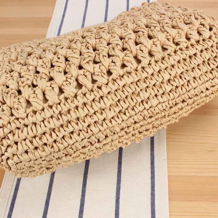 Handbag made of naturally untreated woven material with elegant chain embellishment Bowlift