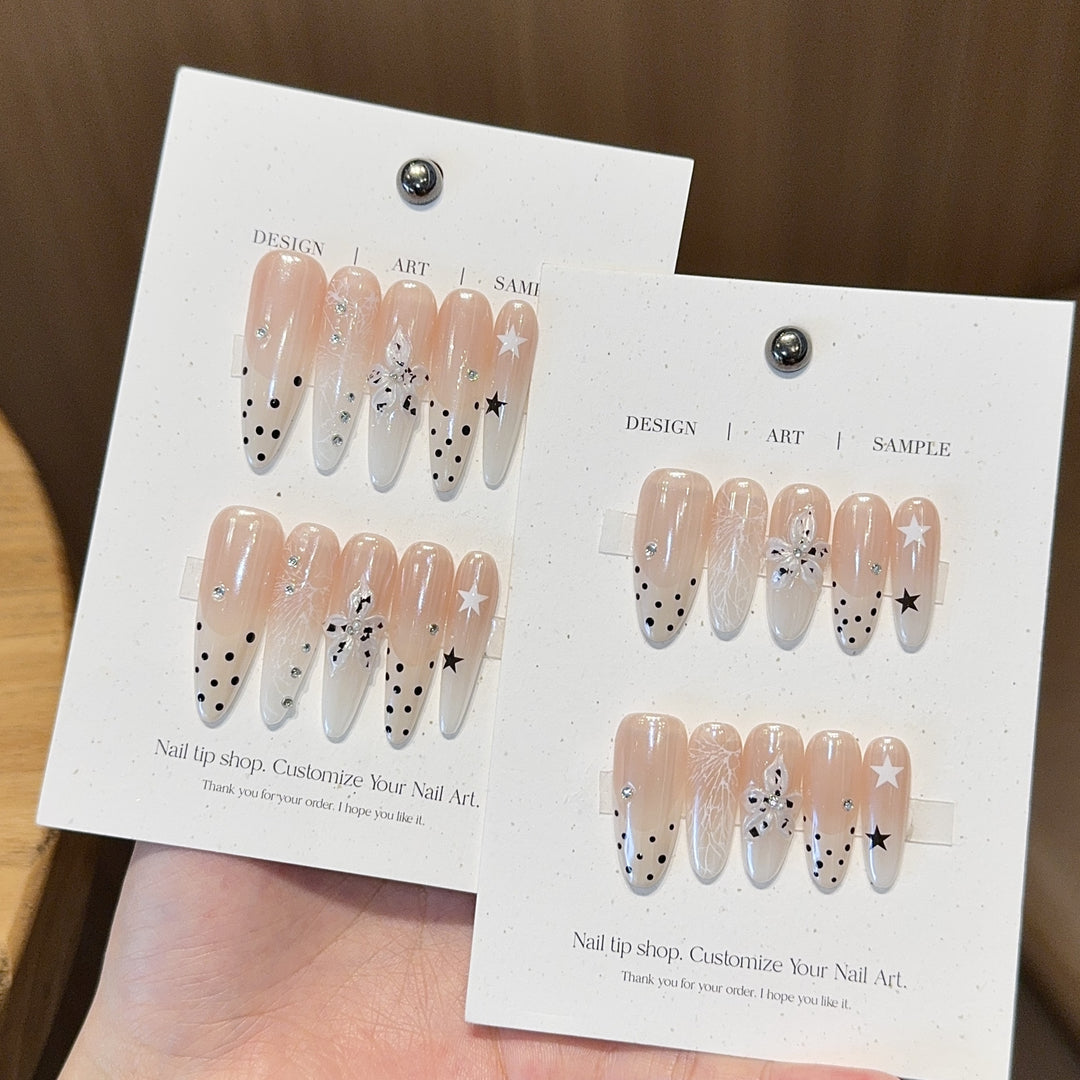 Acrylic Nails Set with Creative Designs and Shimmering Accents Bowlift
