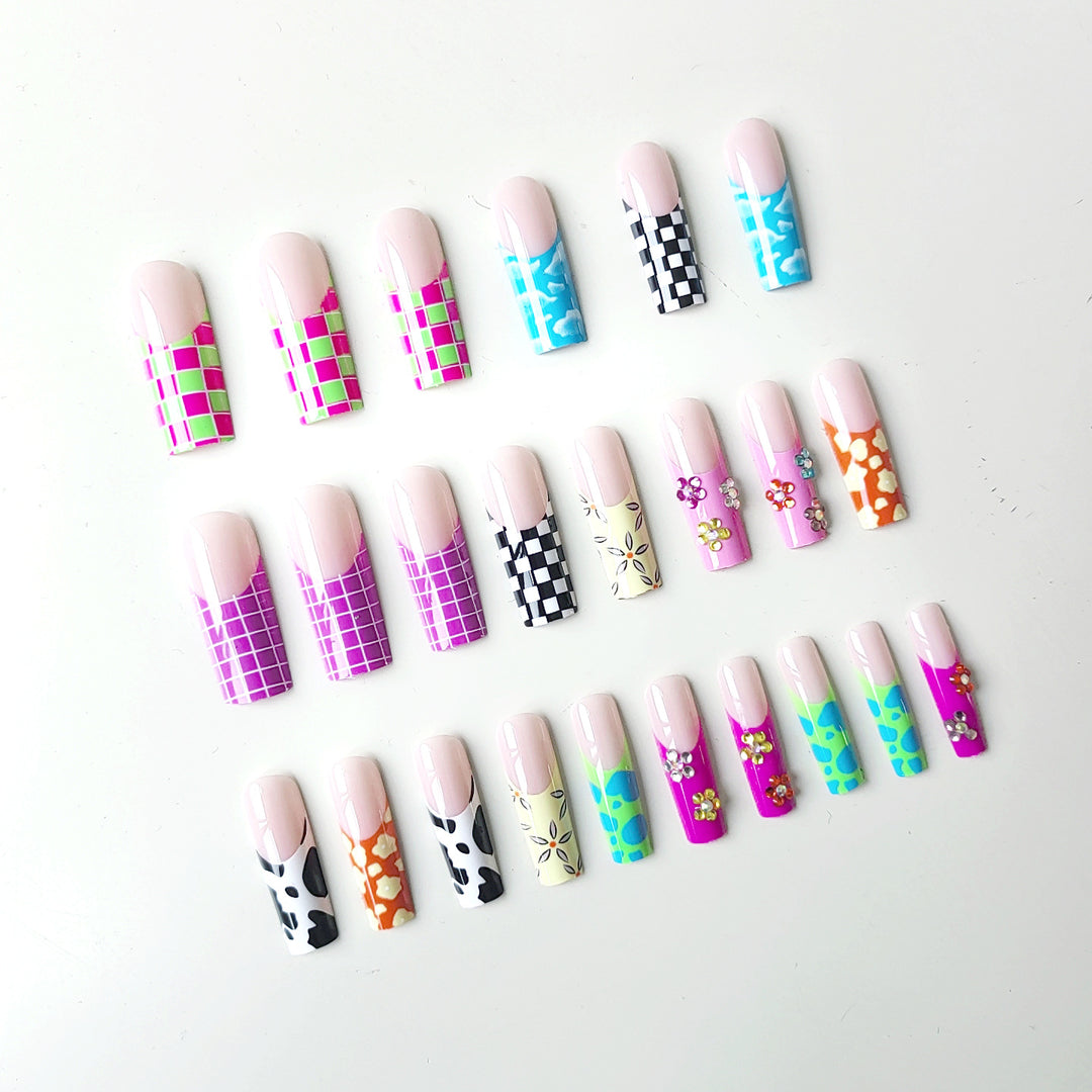 Nail art set with creative designs and shimmering accents Bowlift
