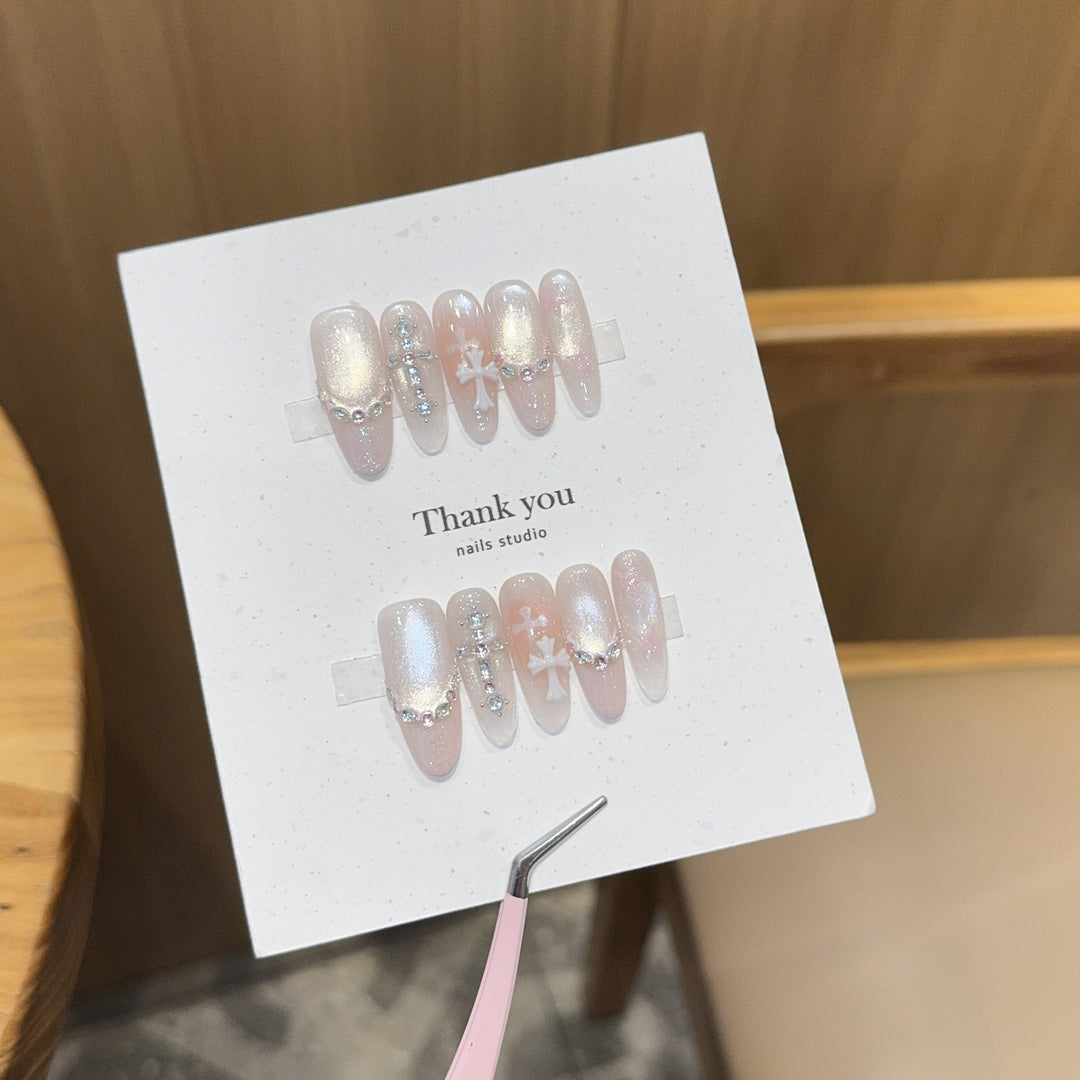 Artificial nails with sparkling rhinestone and glitter effects Bowlift