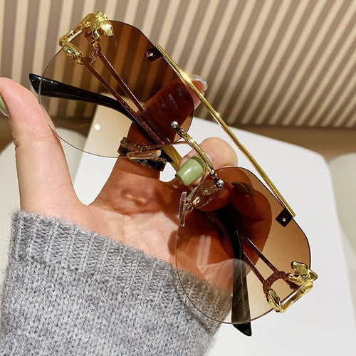 Women Designer Sunglasses with Unique Animal Accent Bowlift