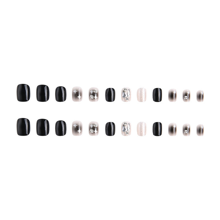 Artificial nail set with glamorous glitter and crystal decorations Bowlift