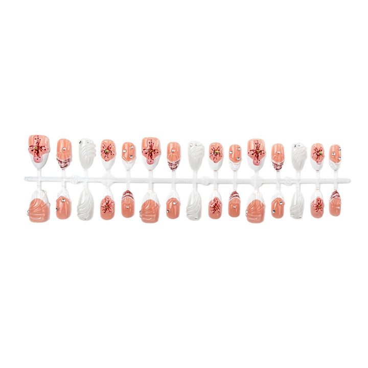 Artificial nails with handcrafted flower and glitter elements Bowlift