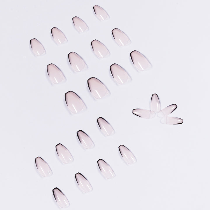 Artful stiletto nails with elegant black tip decoration Bowlift