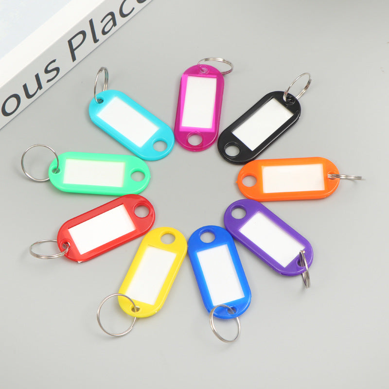 Unisex writable keychain with clear labeling field Bowlift