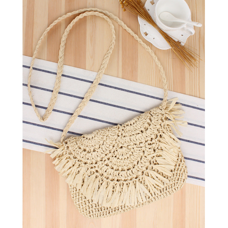 Handcrafted macrame shoulder bag with fringed design Bowlift