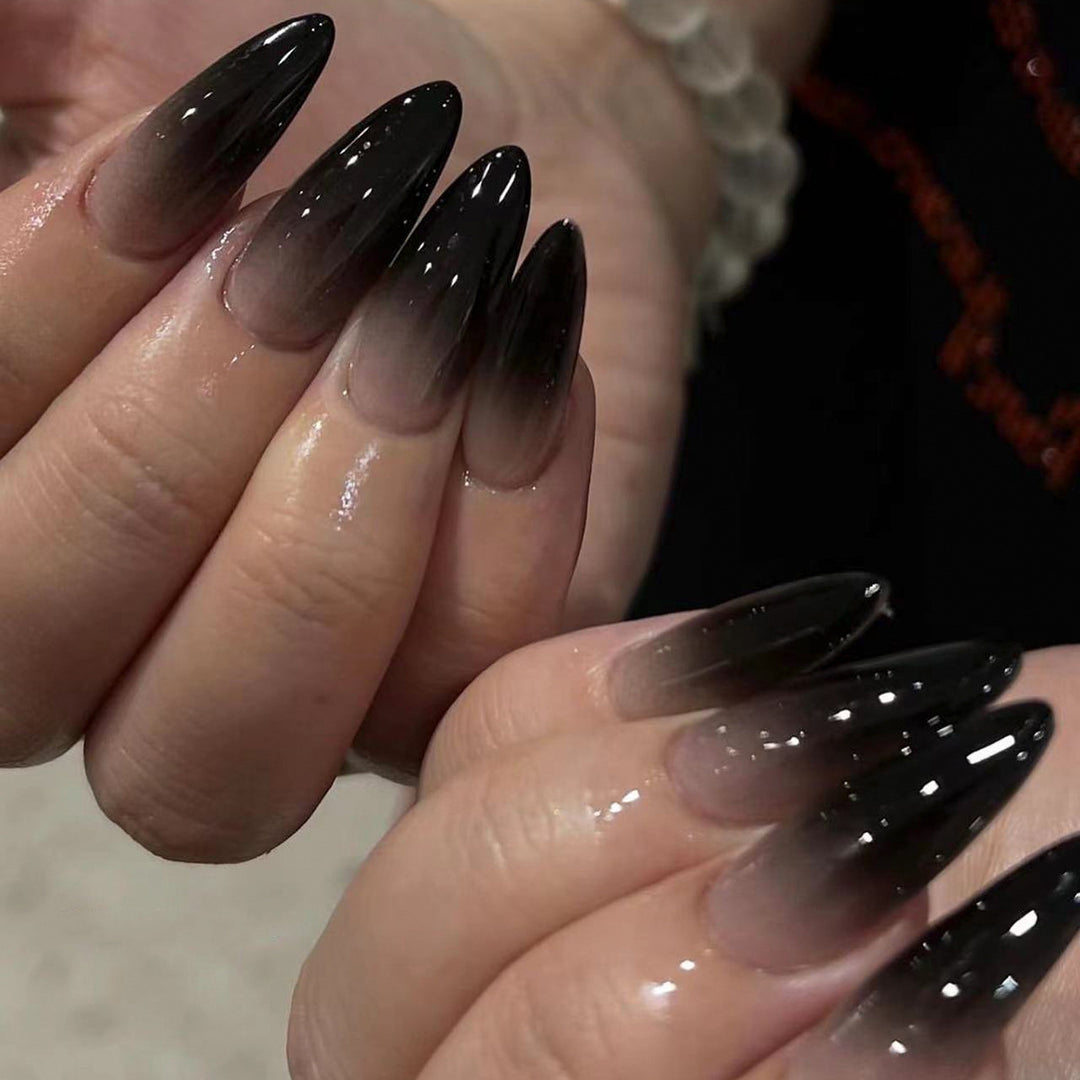 Creative Stiletto Nail Art with Blood Red Accents Bowlift