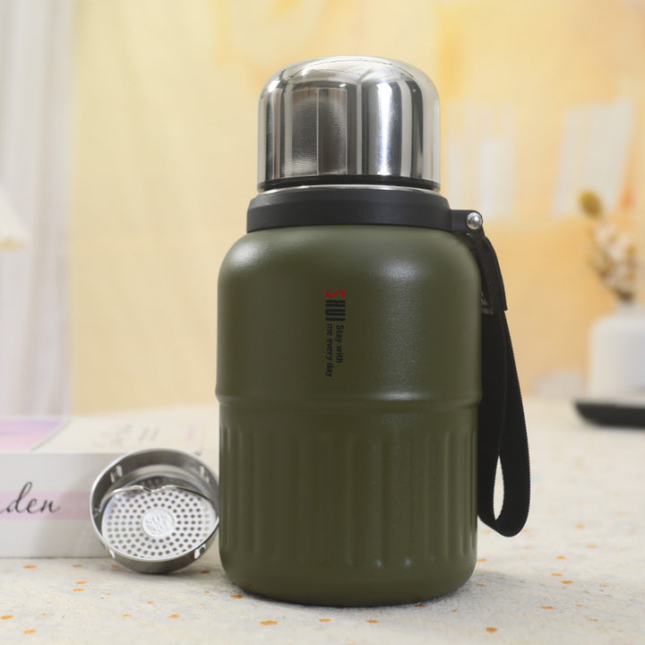 Insulated thermos bottle with practical drinking cup and sturdy carrying strap Bowlift