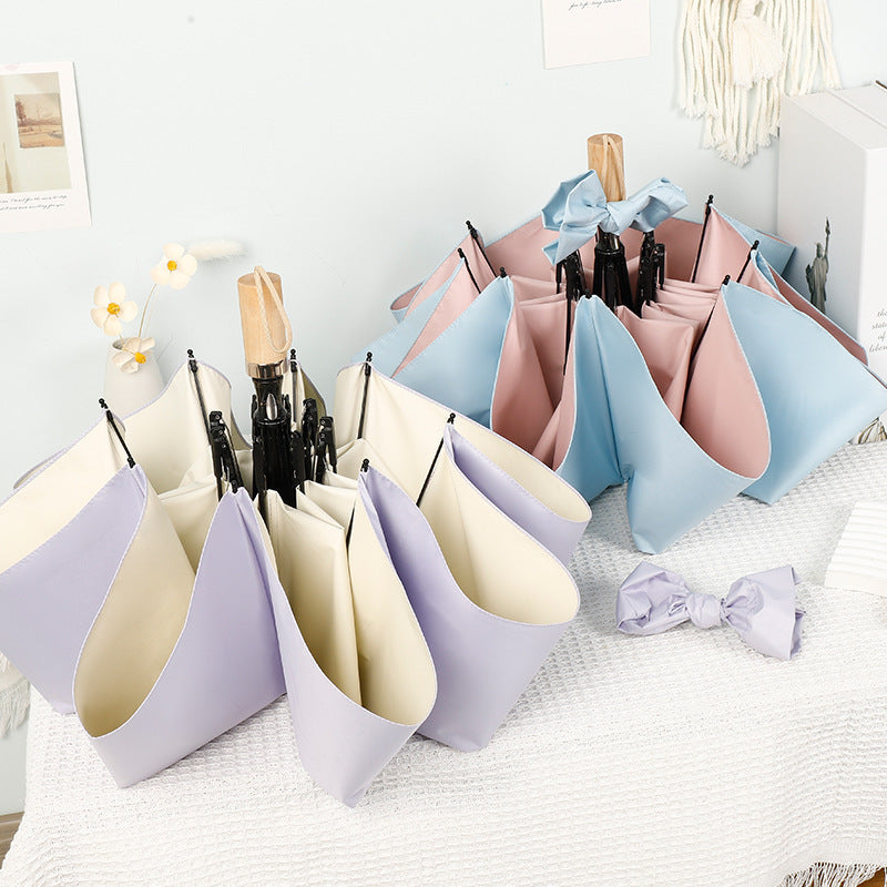 Ladies stylish handheld umbrella with decorative design Bowlift