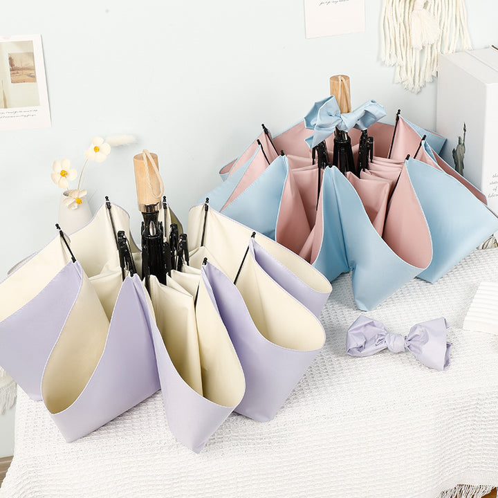 Ladies stylish handheld umbrella with decorative design Bowlift