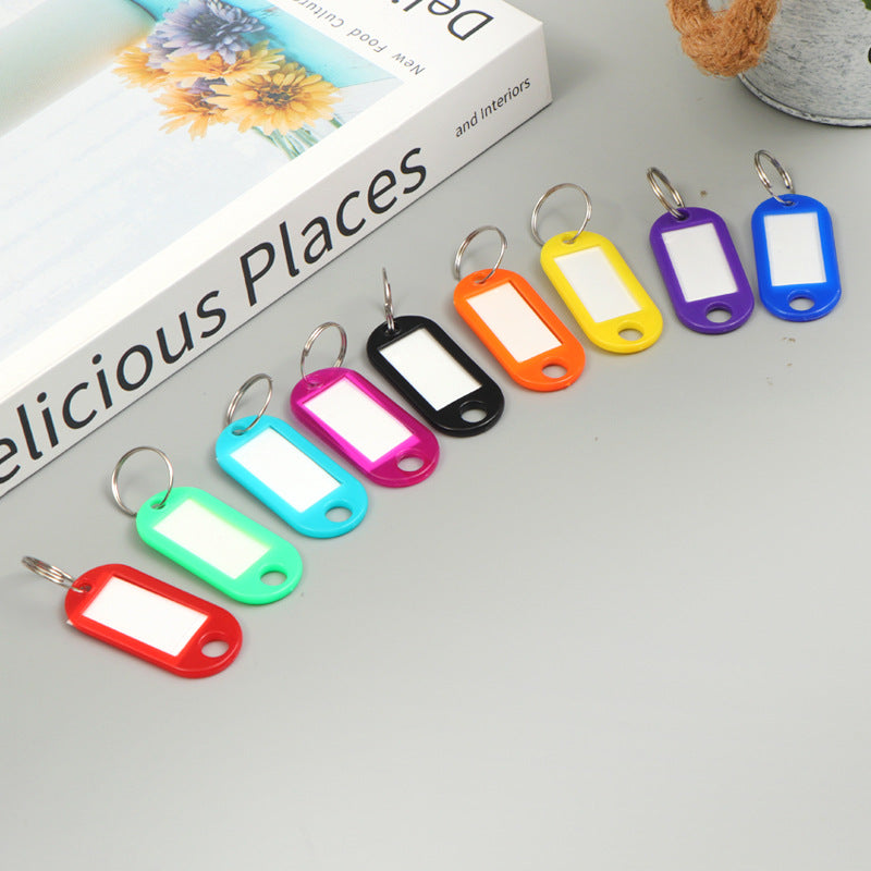Unisex writable keychain with clear labeling field Bowlift