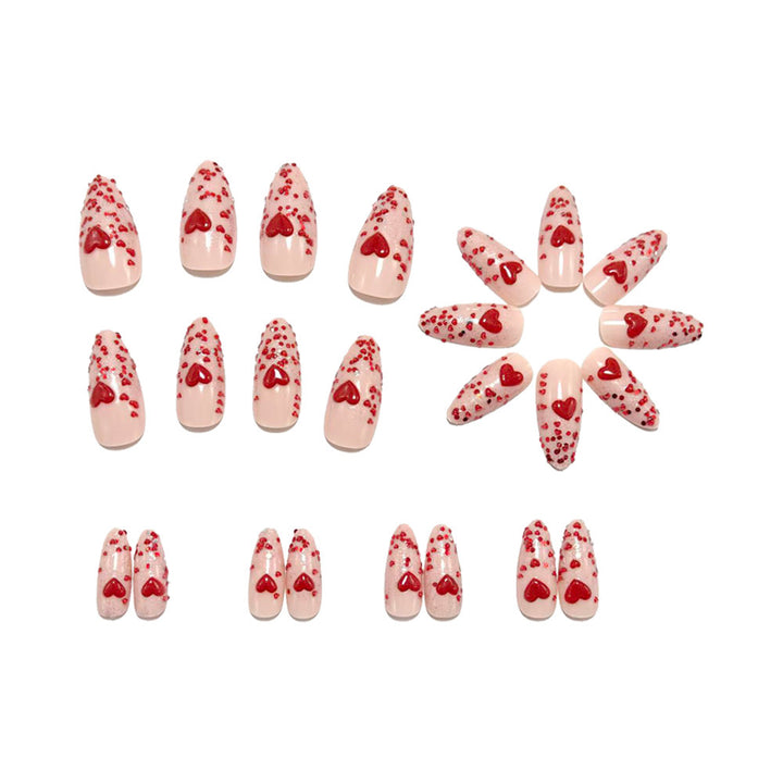 Glamorous artificial nails with heart design and glitter Bowlift