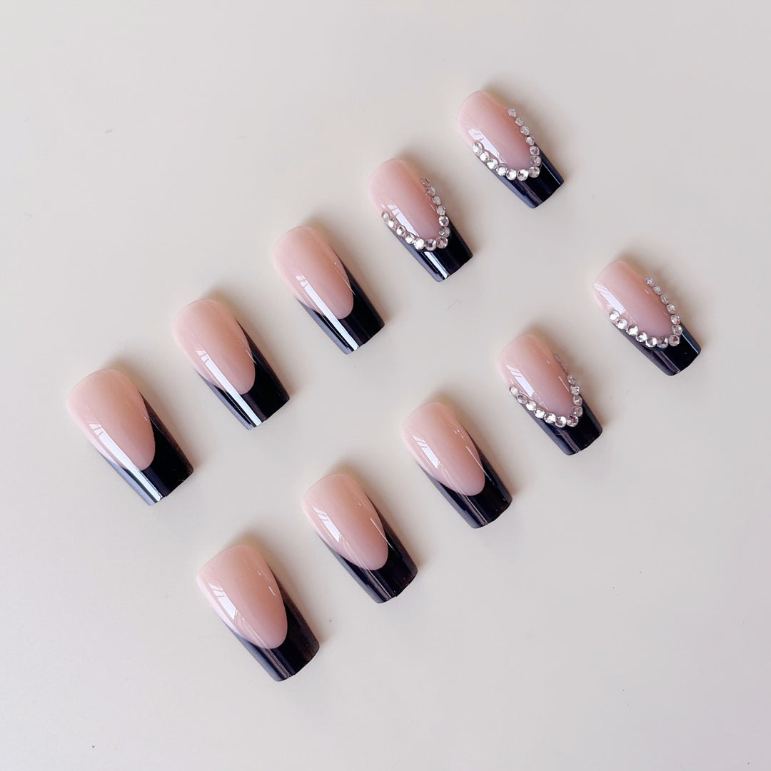 Artificial nail set with elegant tips and glitter accents Bowlift