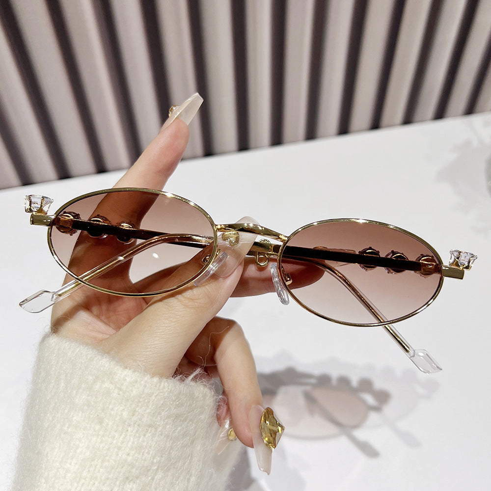 Fashion-Forward Oval Sunglasses with Crystal Accents Bowlift