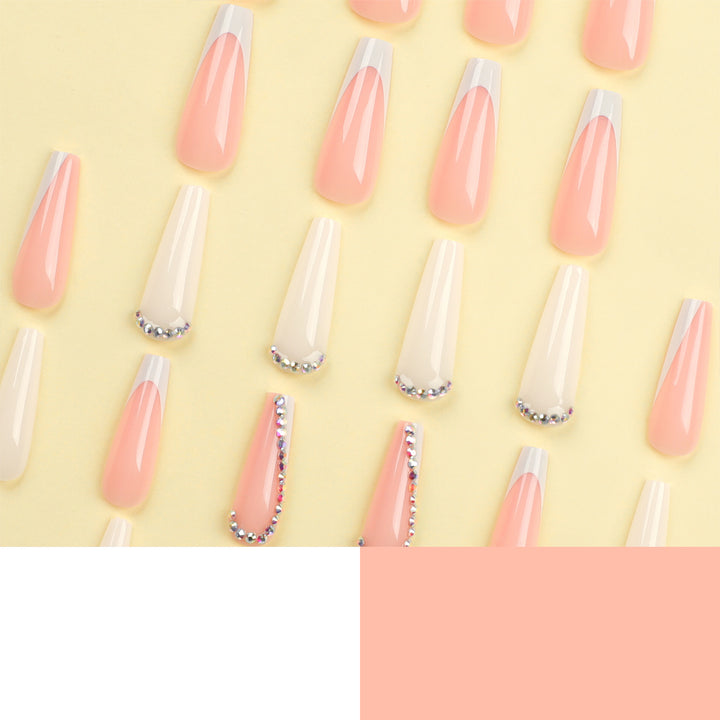 Artful nail extensions with rhinestone embellished accents Bowlift