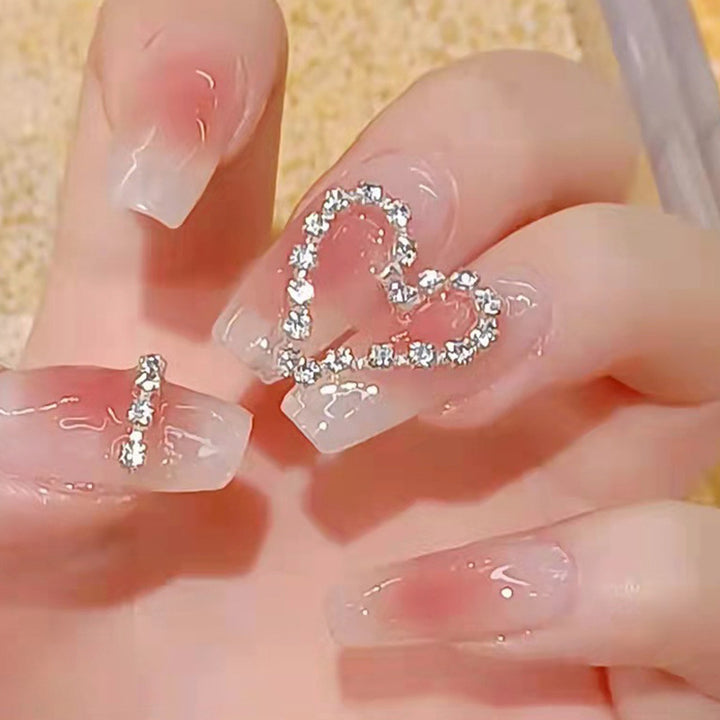 Artificial nails with romantic heart decorations Bowlift