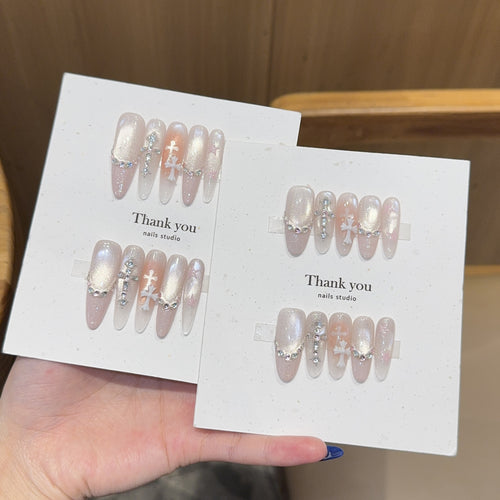 Artificial nails with sparkling rhinestone and glitter effects Bowlift