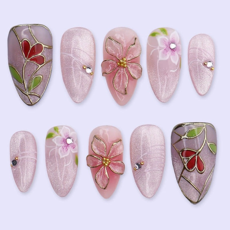 Nail art set with filigree floral decorations and shiny details Bowlift