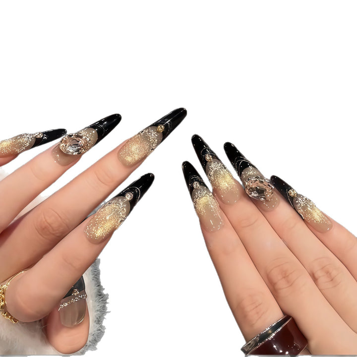 Glamorous artificial nails with extravagant rhinestone and glitter insets Bowlift