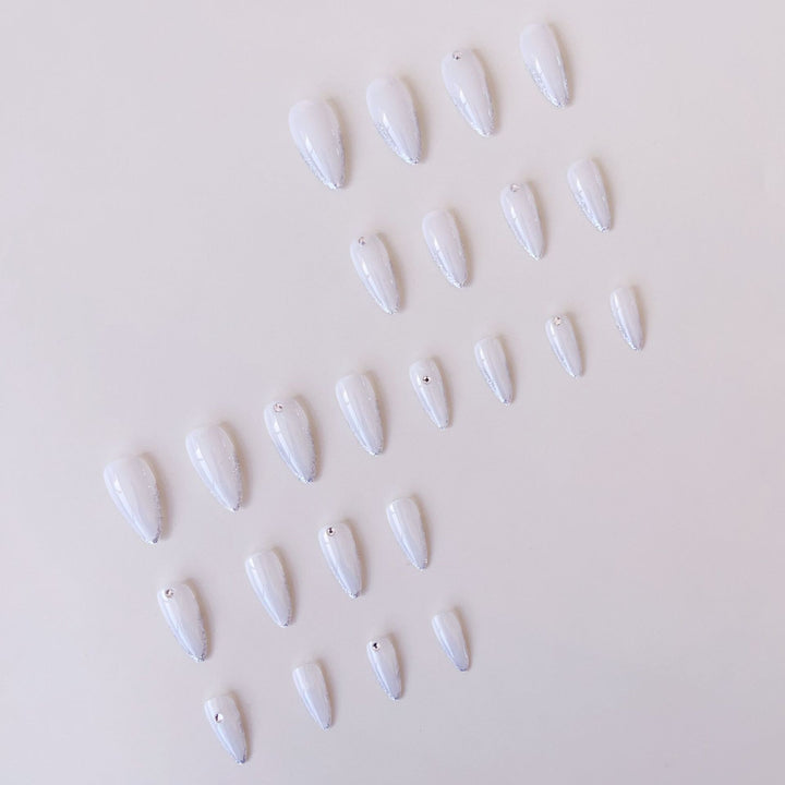 Acrylic nail set with elegant tips and sparkling accents Bowlift