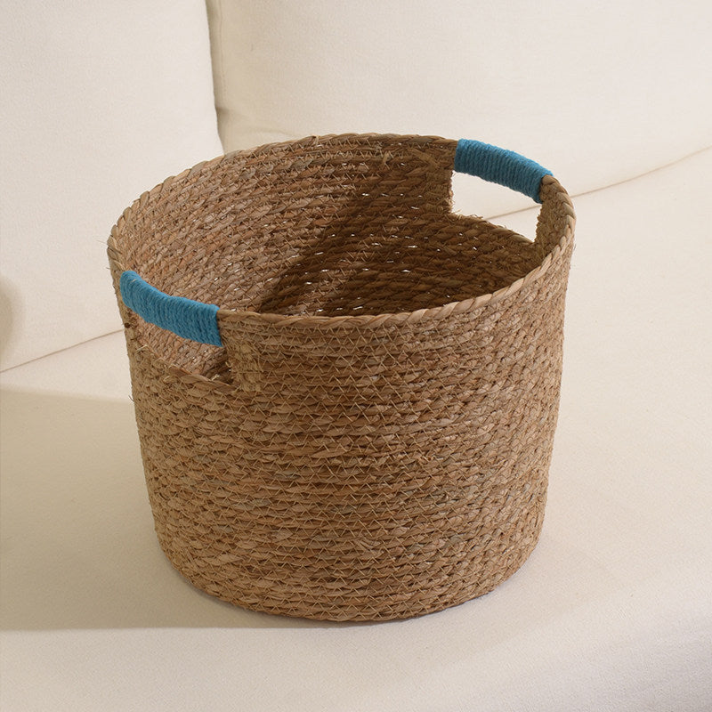 Stylish storage basket made of woven natural fibers Bowlift