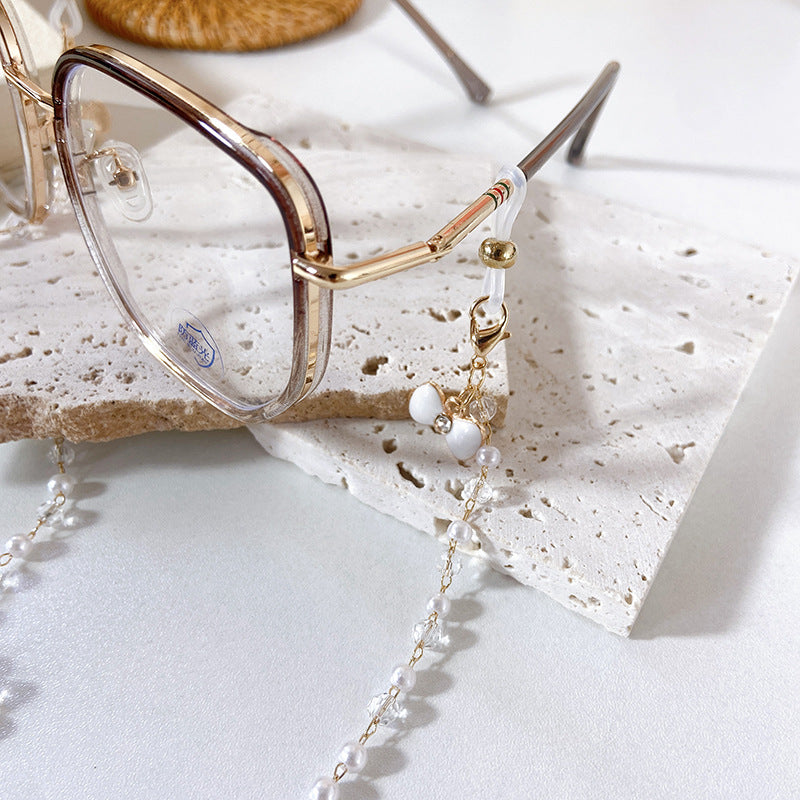 Elegant earrings with pearls and flower pendants Bowlift