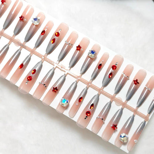 Artificial nails with glamorous design and sparkling accents Bowlift