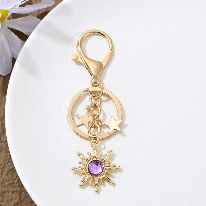 Keychain with Sparkling Sun Motif Bowlift