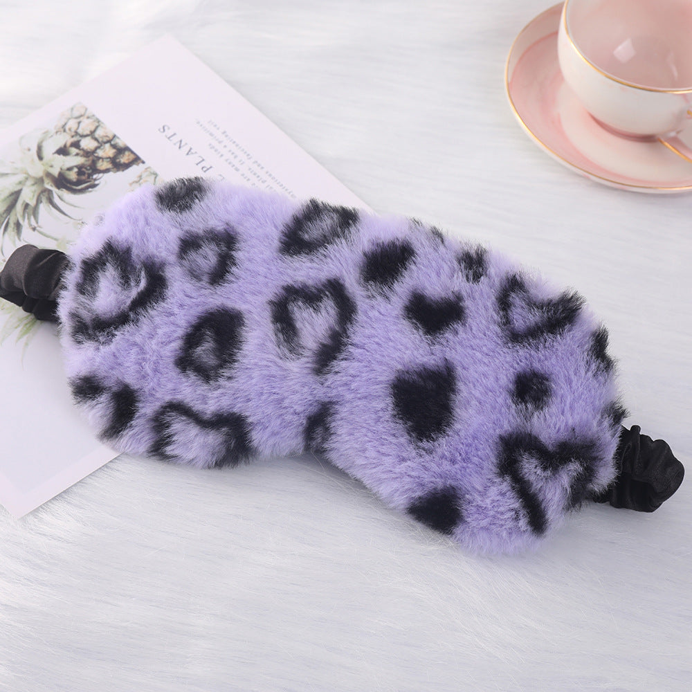 Women's cuddly faux fur sleep mask with heart-embossed surface and gathered comfort band Bowlift