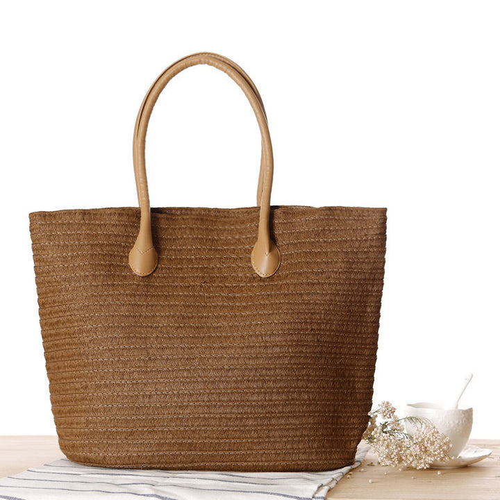Spacious straw shopper with leather carrying handles Bowlift