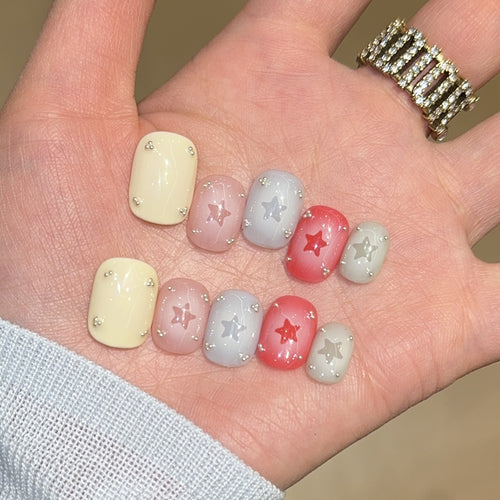 Artificial nails with sparkling star motifs Bowlift
