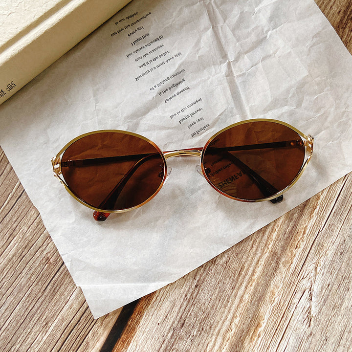 Round Sunglasses with Golden Accents Bowlift