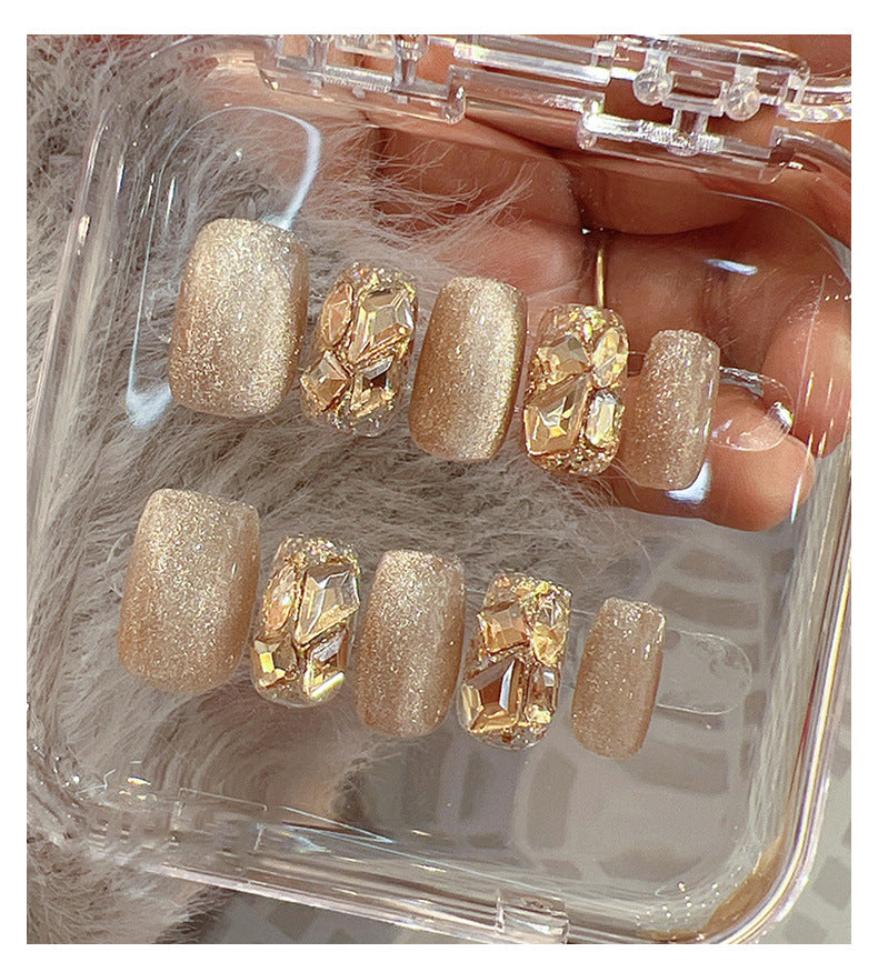 Artifical nail tips with glitter and rhinestones Bowlift