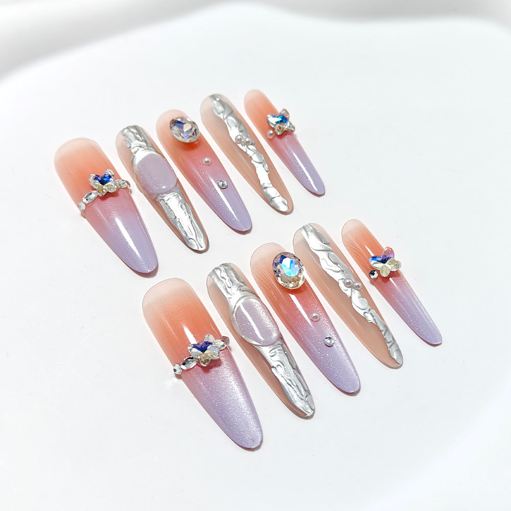 Artificial nails with elegant ombre design and jewelry accents Bowlift