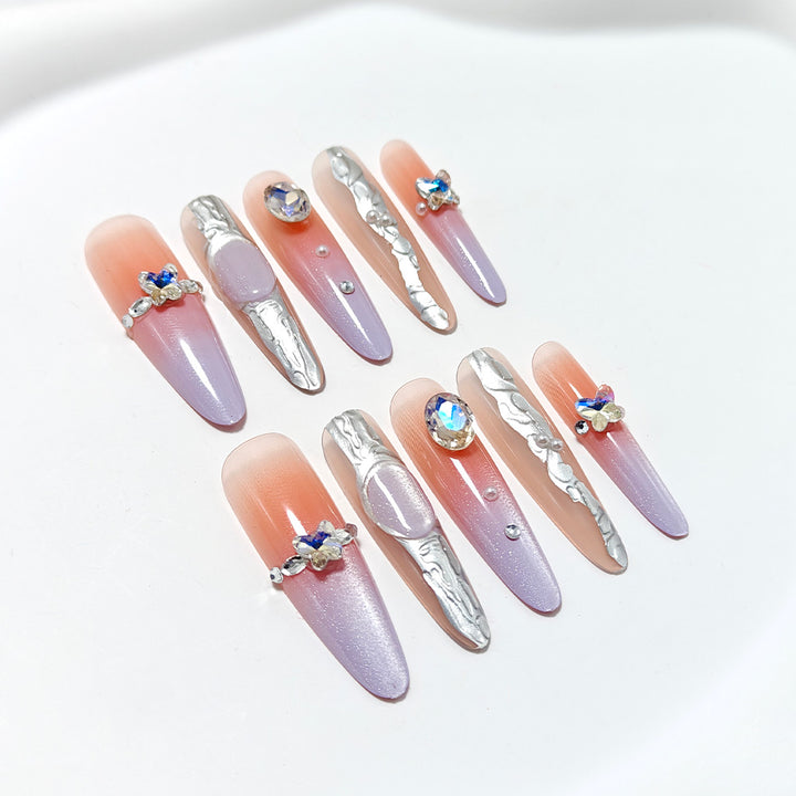 Artificial nails with elegant ombre design and jewelry accents Bowlift