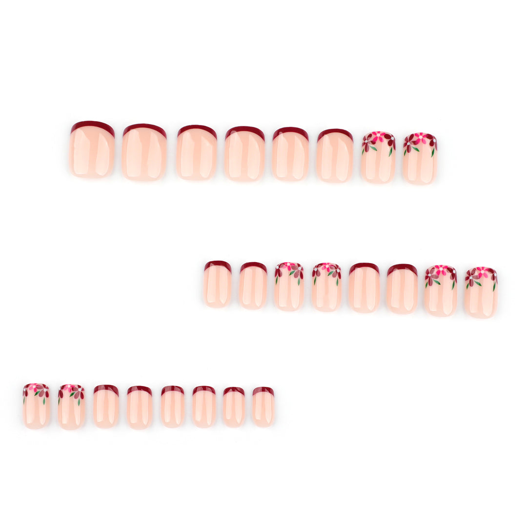Artful nail design with flower and gradient effects Bowlift