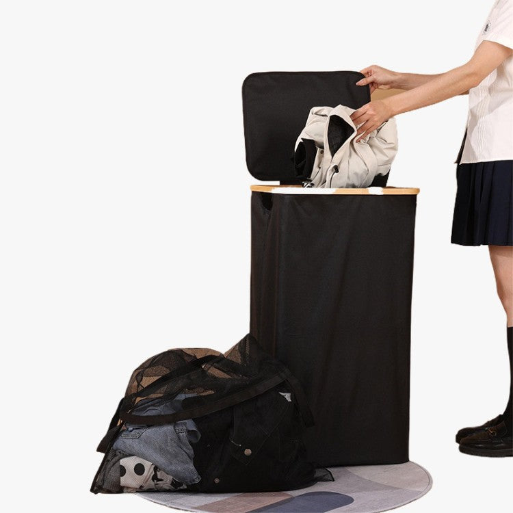 Elegant laundry container with practical lid and carrying system Bowlift